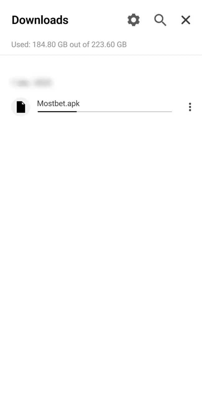 Mostbet.apk descargándose en la lista de Descargas de Android