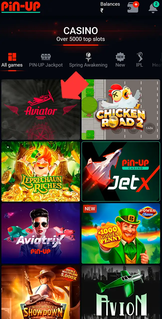 Lobby del casino Pin-Up en All games con una flecha en la ficha de Aviator